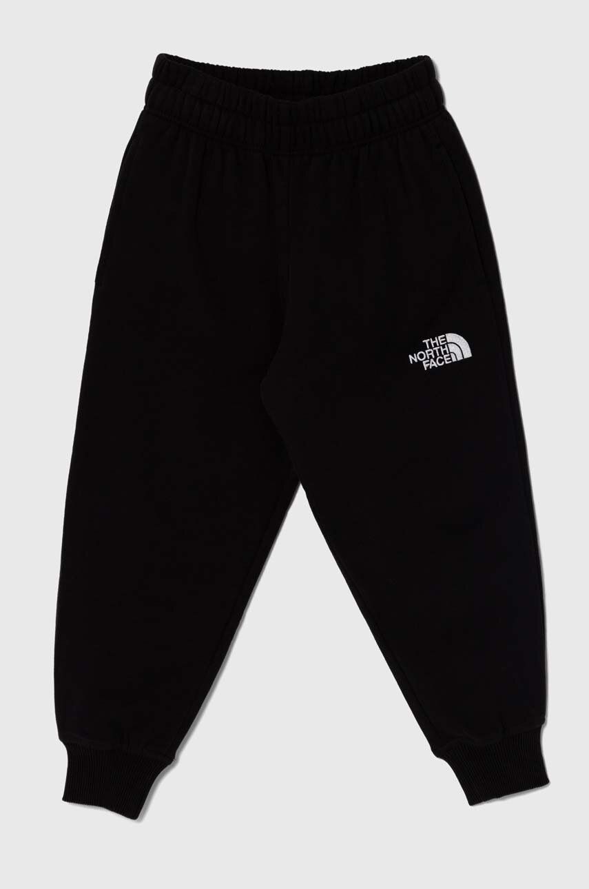 The North Face pantaloni de trening din bumbac pentru copii OVERSIZED JOGGERS culoarea negru, neted