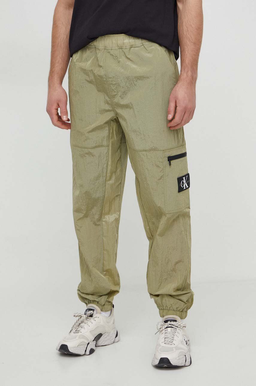 Levně Kalhoty Calvin Klein Jeans pánské, zelená barva, J30J324695