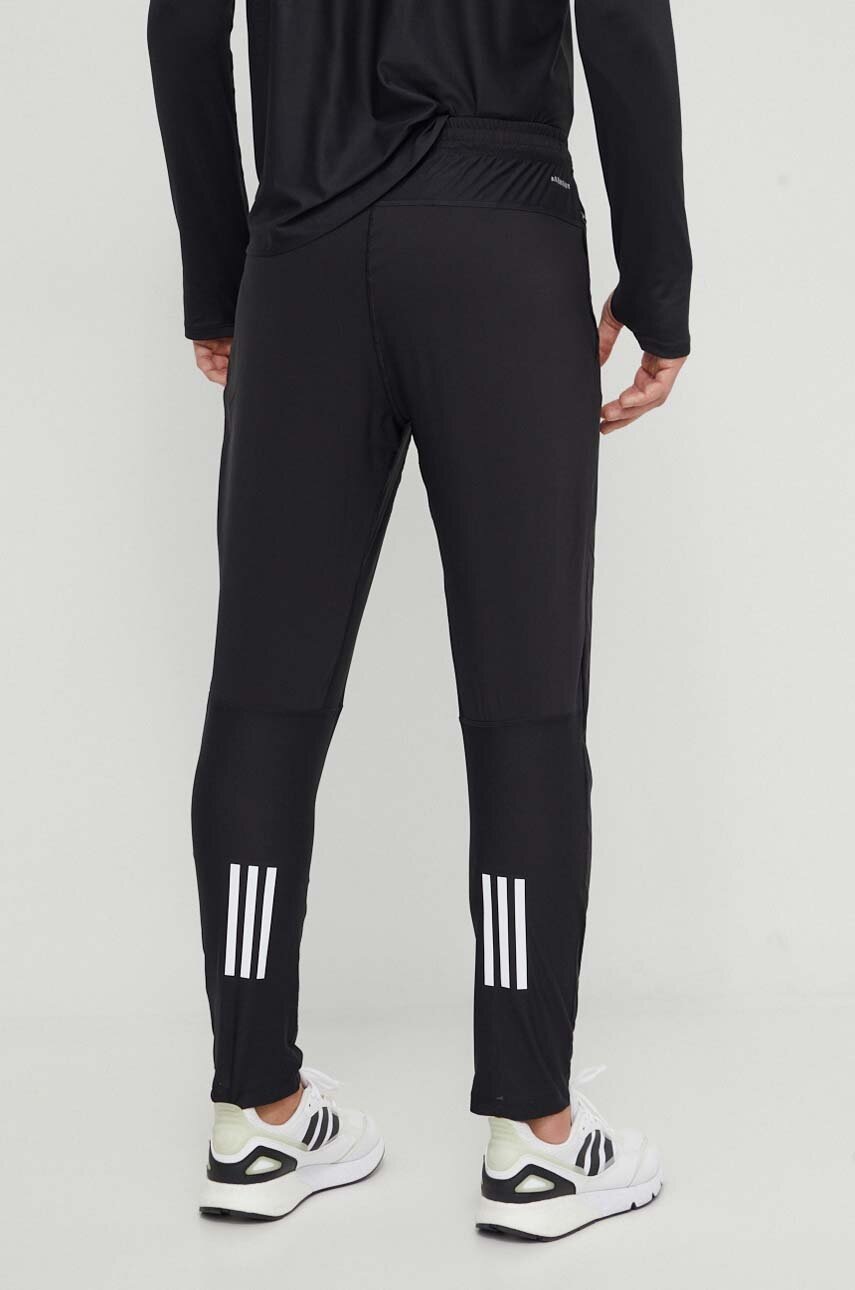 Bežecké nohavice adidas Performance Own the Run čierna farba, s potlačou, IK5024