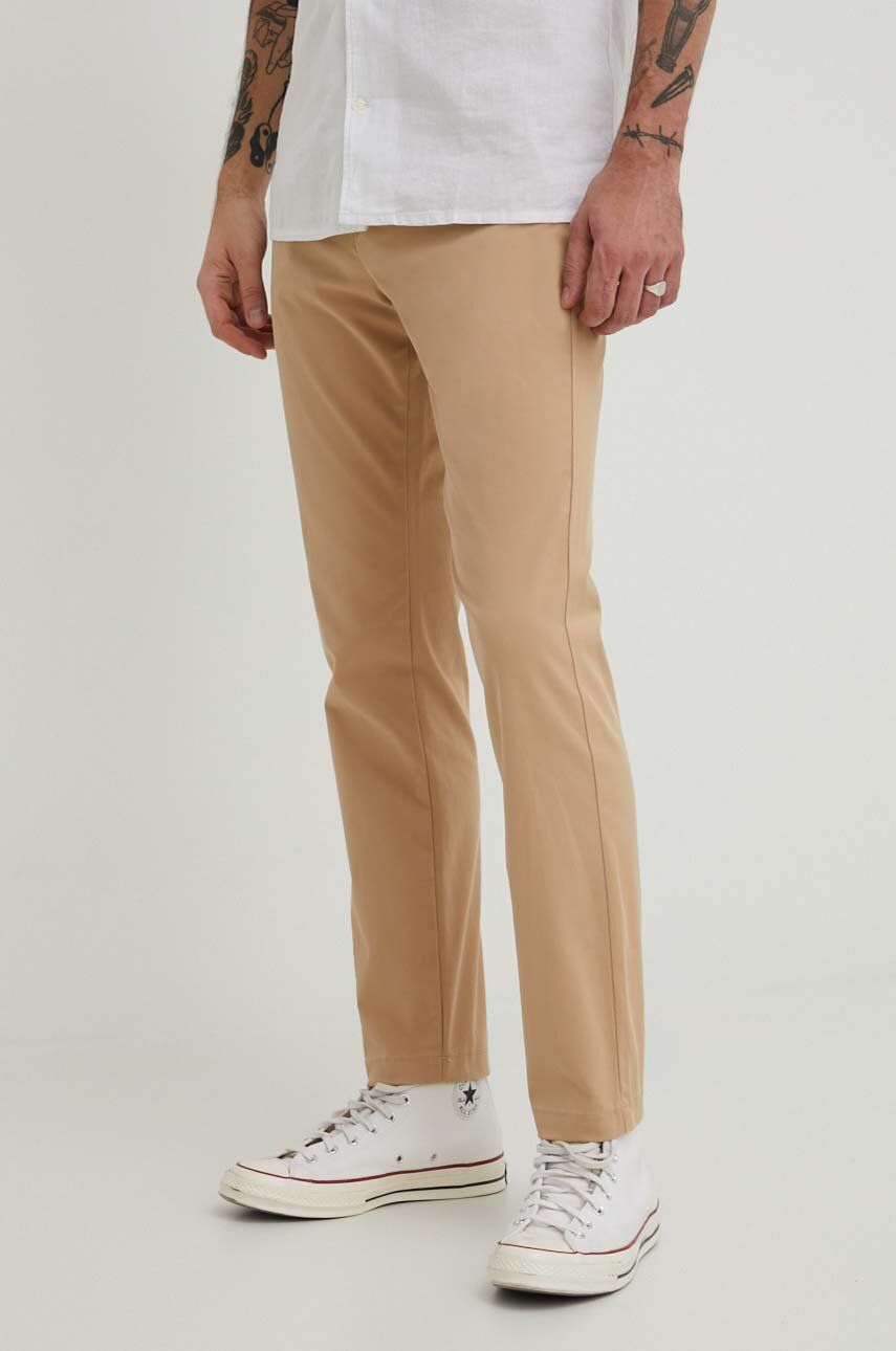 Levně Kalhoty Tommy Jeans pánské, béžová barva, přiléhavé, DM0DM19166