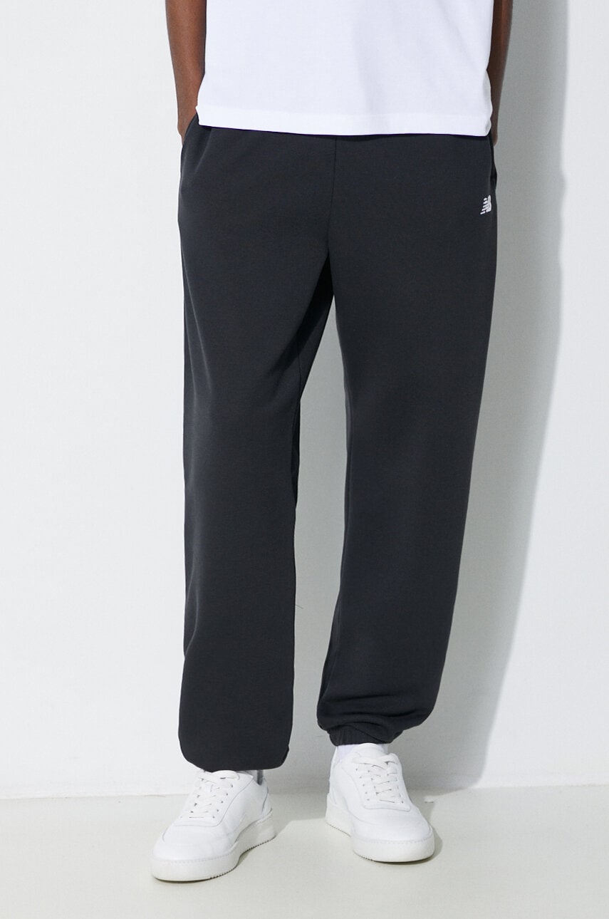 Tepláky New Balance Essentials French Terry Jogger