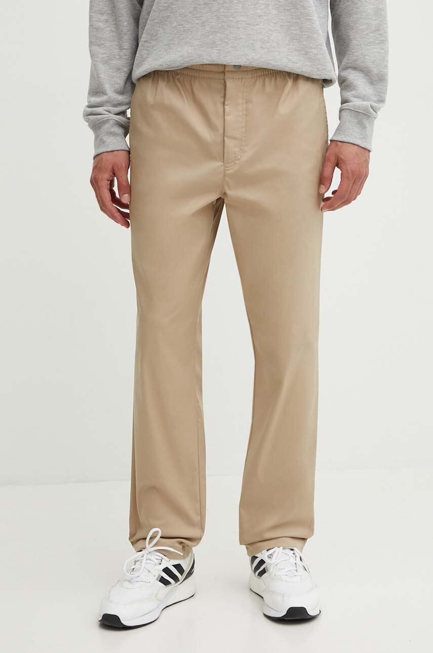 Kalhoty New Balance Twill Straight Pant 30" pánské, béžová barva, jednoduché, MP41575SOT