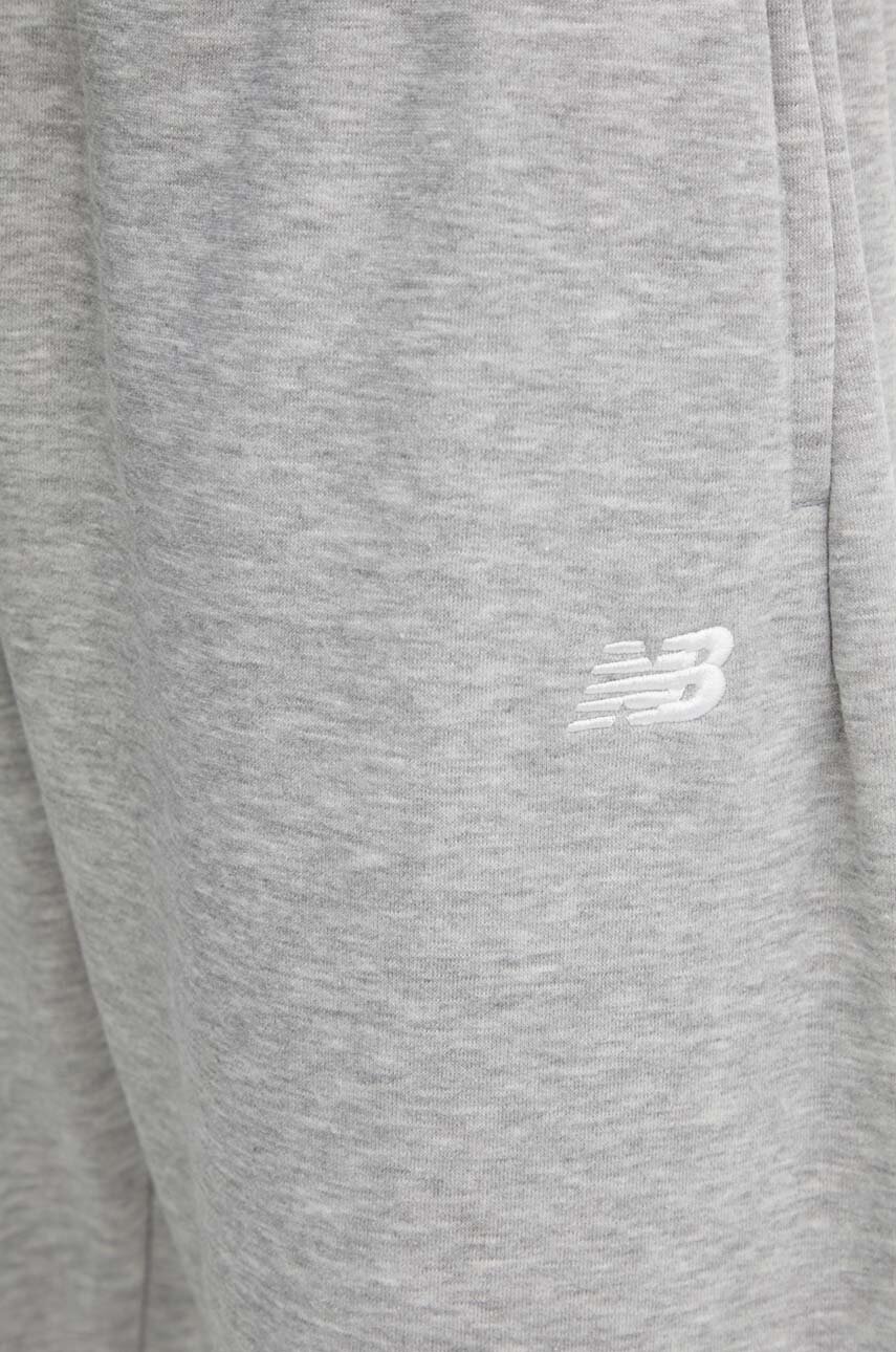 Tepláky New Balance Sport Essentials