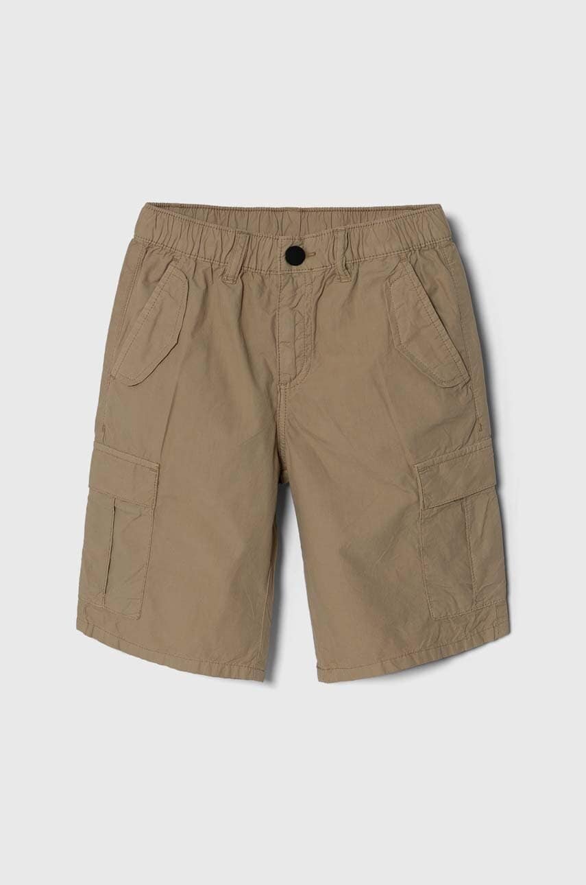 Levně Dětské bavlněné šortky Guess béžová barva