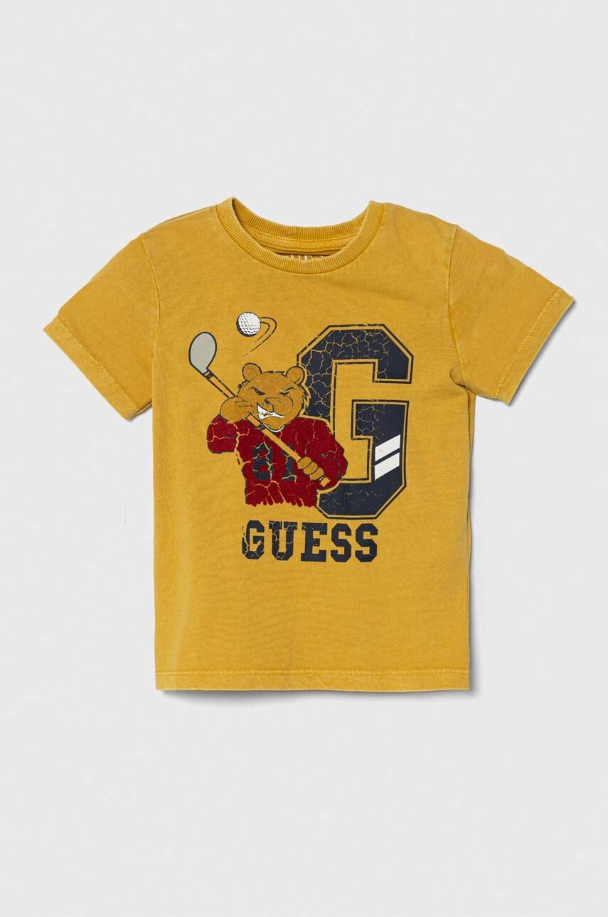 

Детская хлопковая футболка Guess цвет жёлтый с принтом