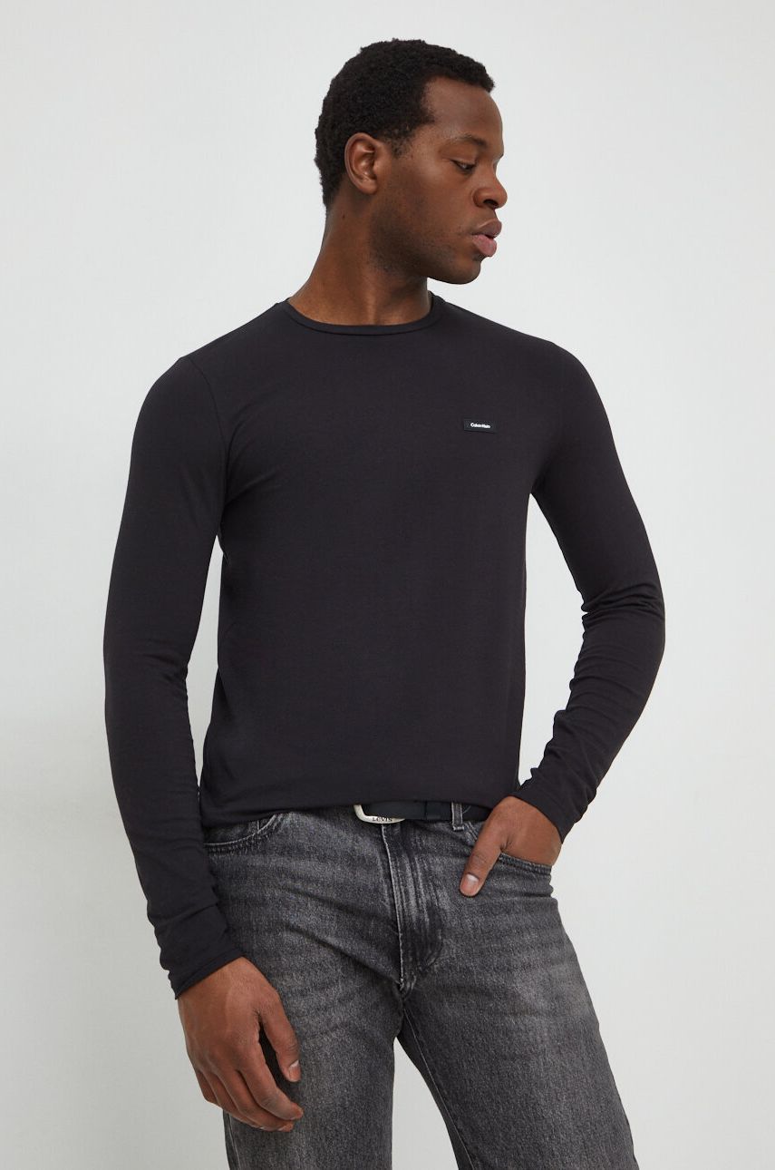 Levně Tričko s dlouhým rukávem Calvin Klein černá barva, K10K112725