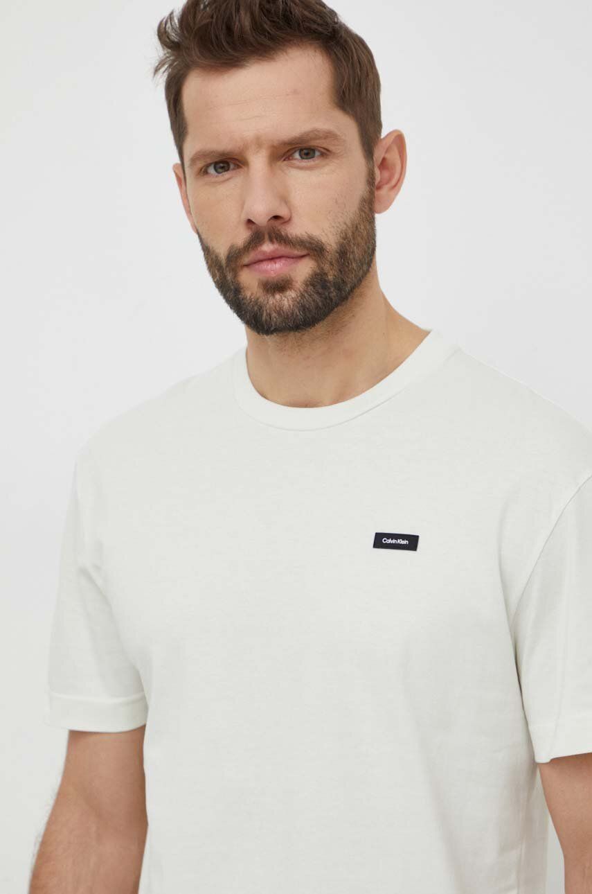 Levně Bavlněné tričko Calvin Klein černá barva, K10K112749
