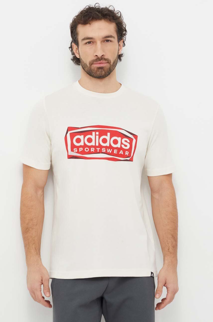 Levně Bavlněné tričko adidas béžová barva, s potiskem, IS2880