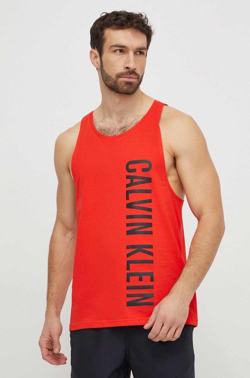 Levně Bavlněné plážové tričko Calvin Klein červená barva, KM0KM00997