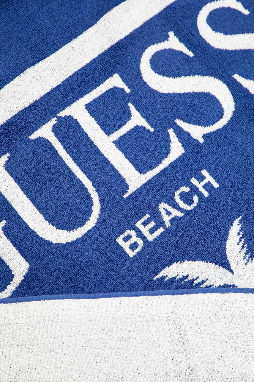 Хлопковое полотенце Guess цвет фиолетовый E5GZ14 SG00P Хлопковое полотенце Guess цвет фиолетовый E5GZ14 SG00P