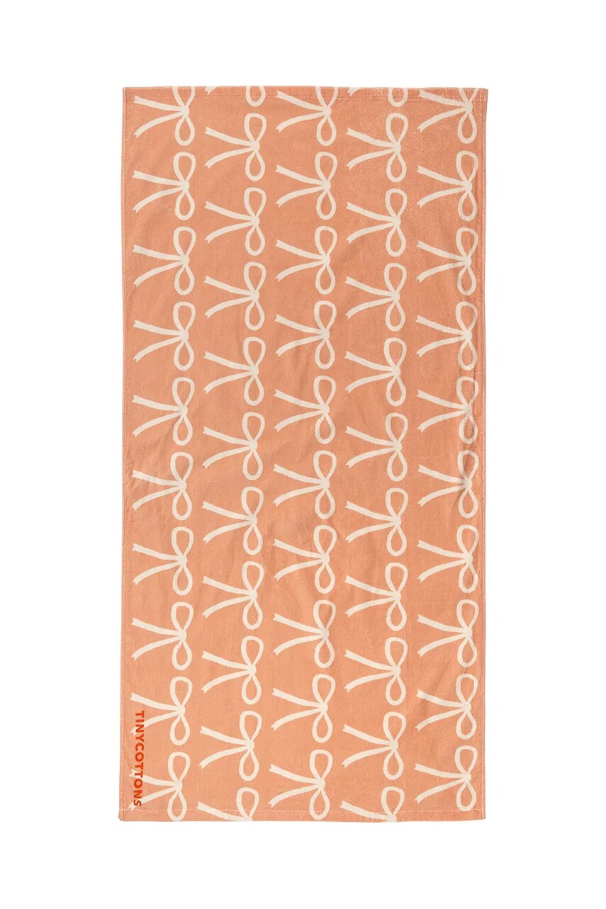 Levně Dětský bavlněný ručník Tinycottons BOWS TOWEL oranžová barva, SS25-376