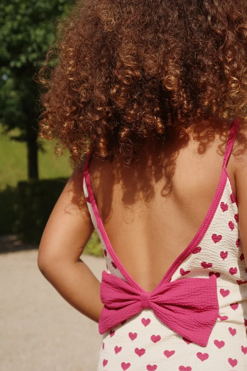 Levně Jednodílné dětské plavky Konges Sløjd BOWIE SWIMSUIT béžová barva, KS103342