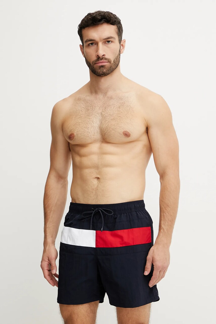 Levně Plavkové šortky Tommy Hilfiger tmavomodrá barva, UM0UM03474