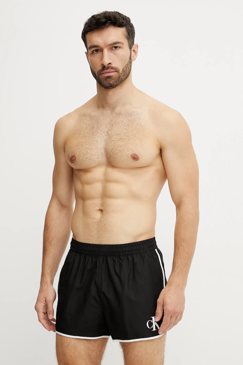 Levně Plavkové šortky Calvin Klein černá barva, KM0KM01119