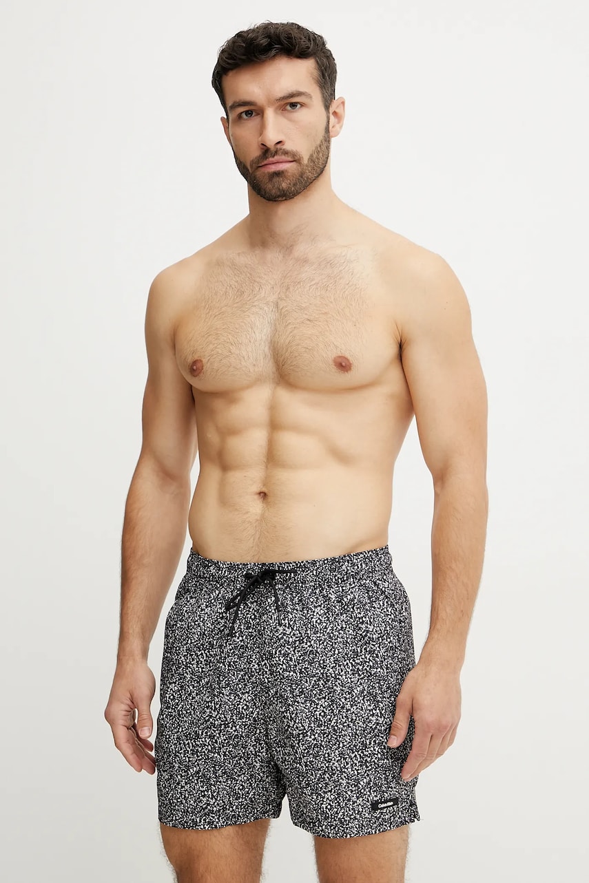 Levně Plavkové šortky Calvin Klein černá barva, KM0KM01120