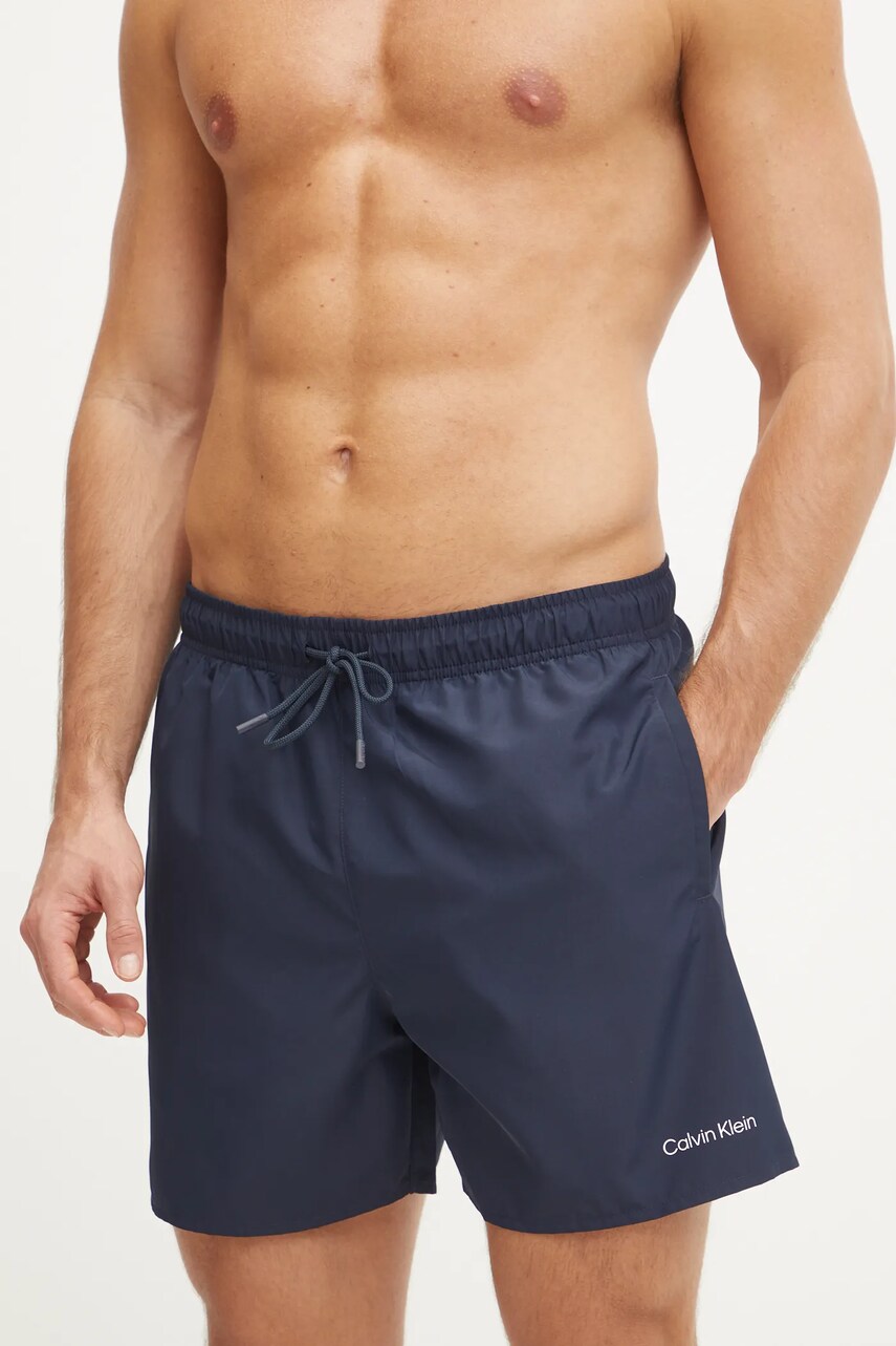 Levně Plavkové šortky Calvin Klein 2-pack tmavomodrá barva, KM0KM01165