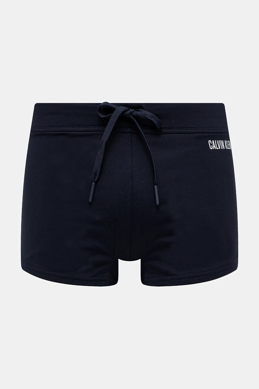 Levně Plavky Calvin Klein tmavomodrá barva, KM0KM01098