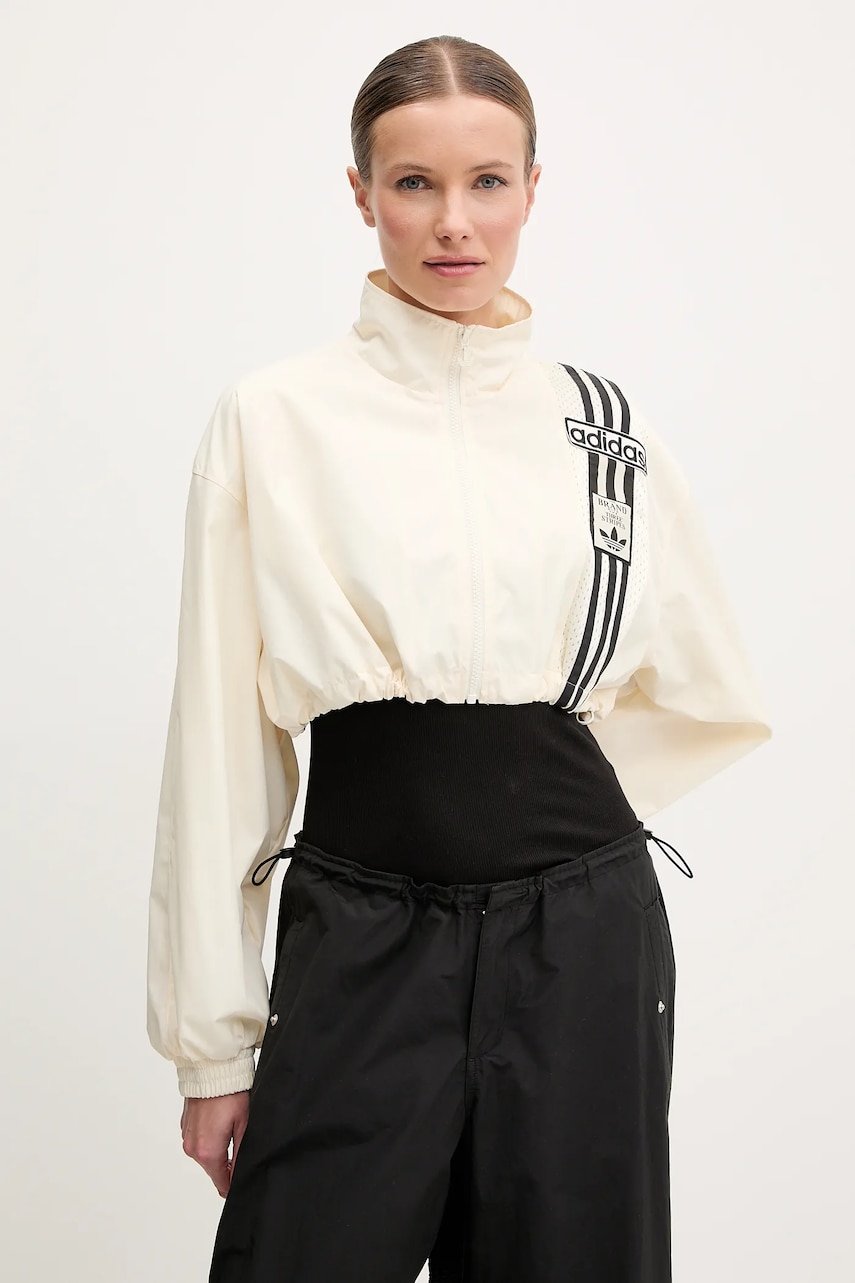 Куртка adidas Originals Woven Track Top цвет бежевый переходная oversize JD0096 Куртка adidas Originals Woven Track Top цвет бежевый переходная oversize JD0096