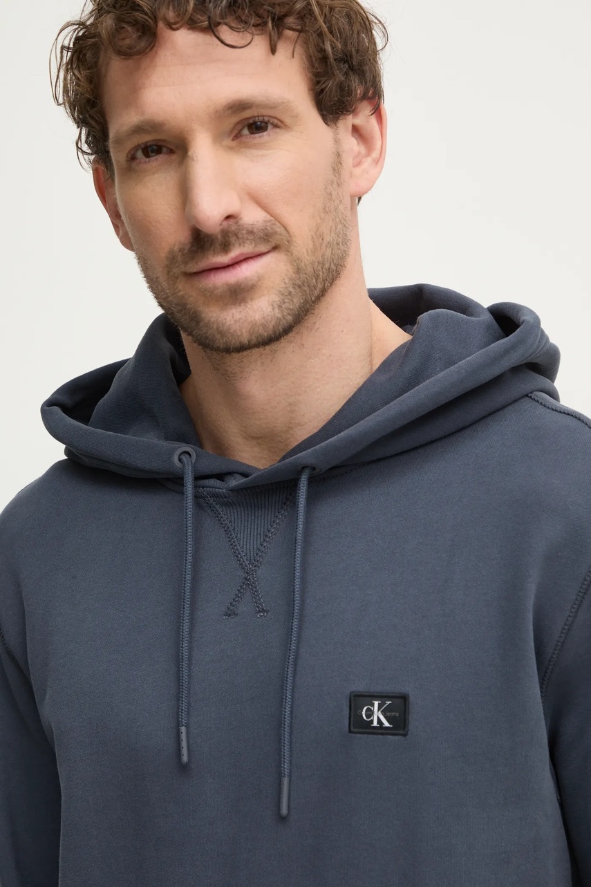 Бавовняна кофта Calvin Klein Jeans чоловіча колір синій з капюшоном однотонна J30J327113 