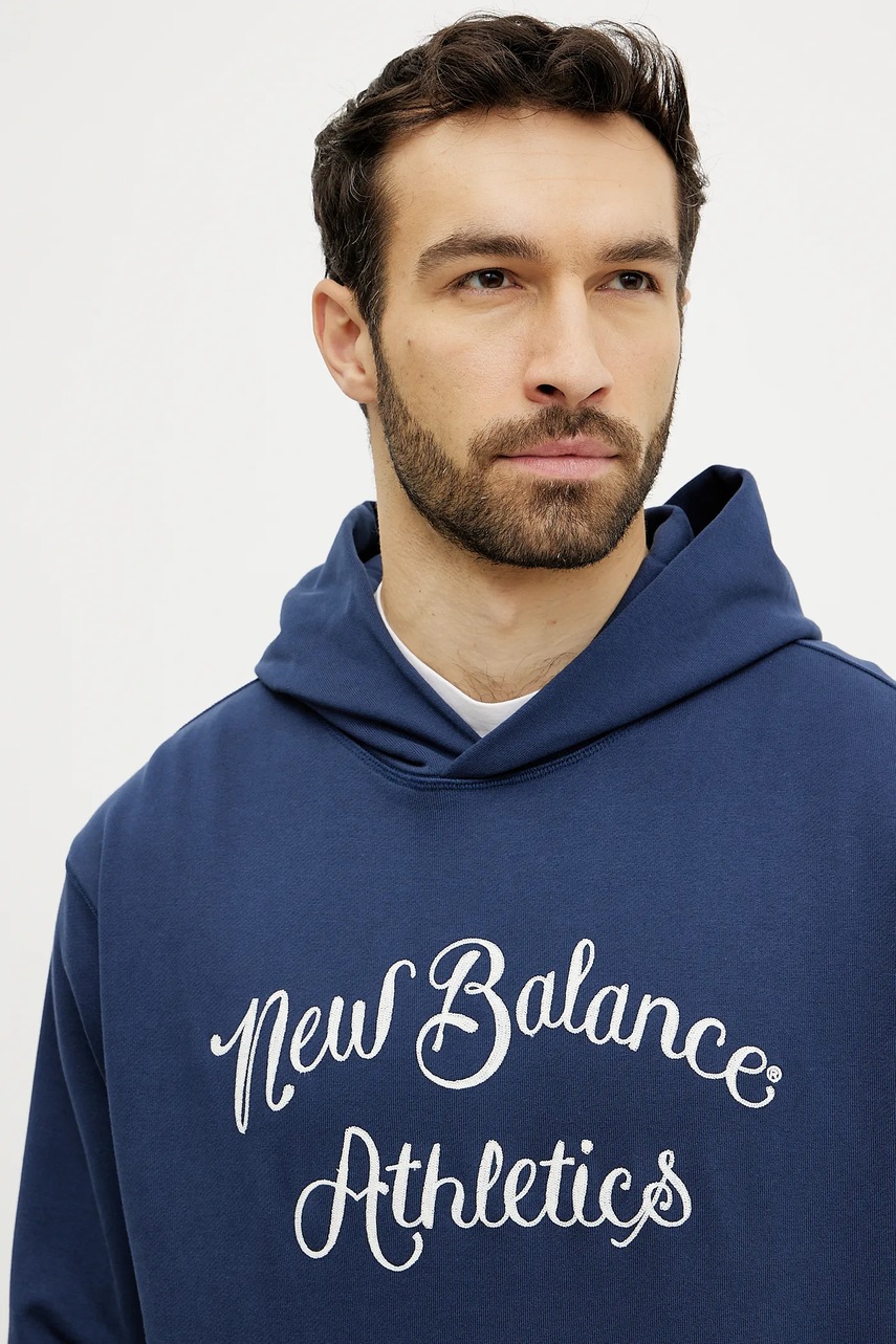 Βαμβακερή μπλούζα New Balance χρώμα: ναυτικό μπλε, με κουκούλα, MT51935NNY φωτογραφία