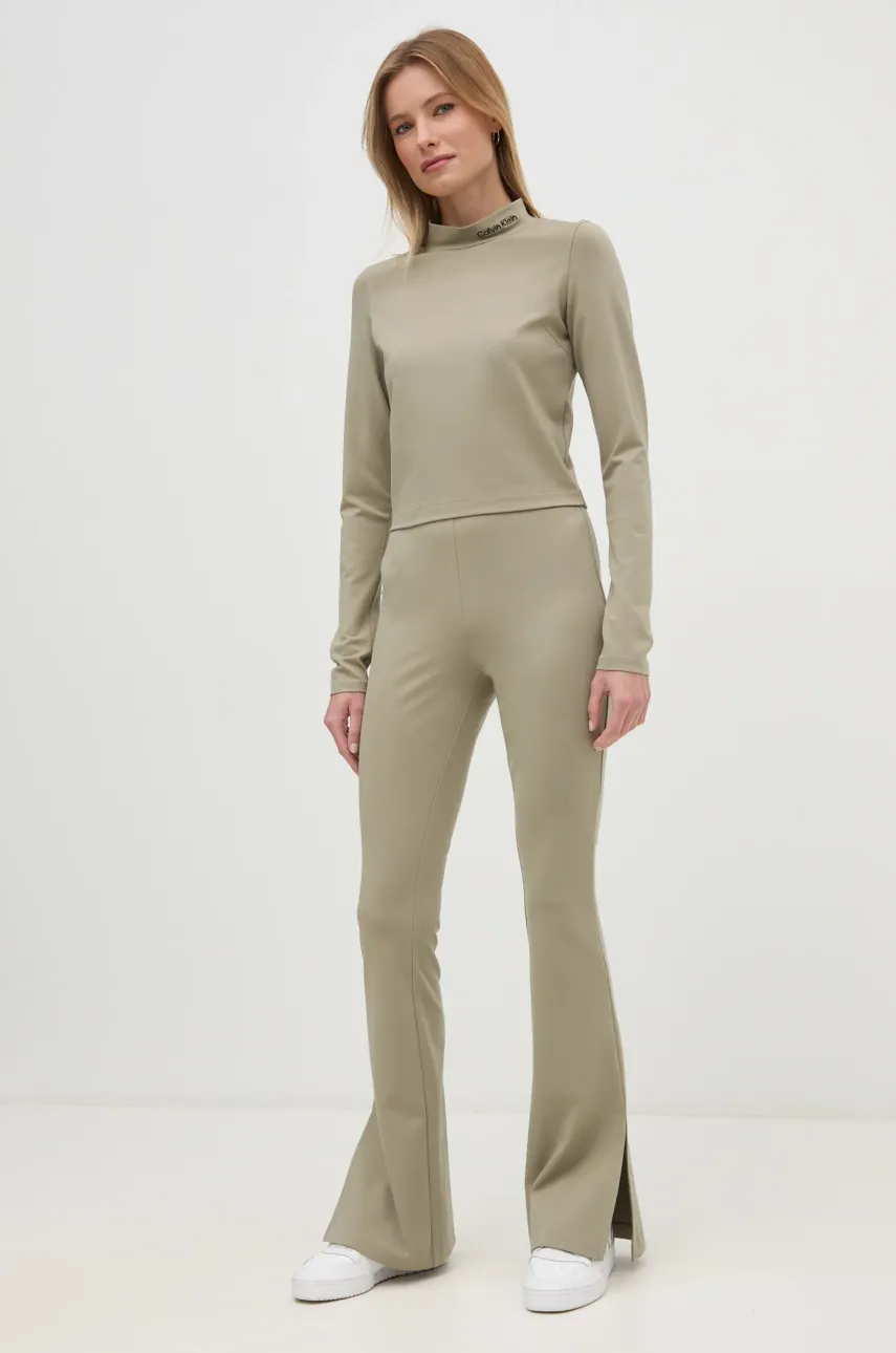 Лонгслив Calvin Klein Jeans женский цвет зелёный с полугольфом J20J224763 Лонгслив Calvin Klein Jeans женский цвет зелёный с полугольфом J20J224763