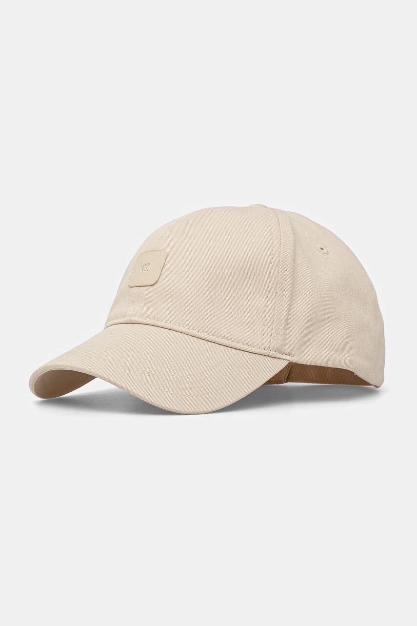 Levně Bavlněná baseballová čepice Calvin Klein Jeans béžová barva, s aplikací, LV04K5052G