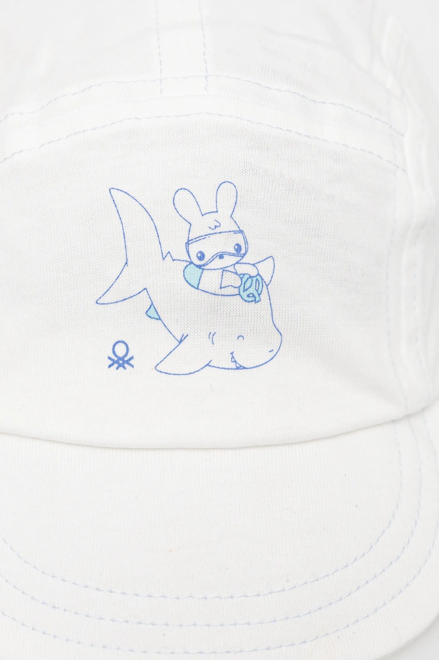 Детская хлопковая кепка United Colors of Benetton цвет белый с принтом 69G7AA00X