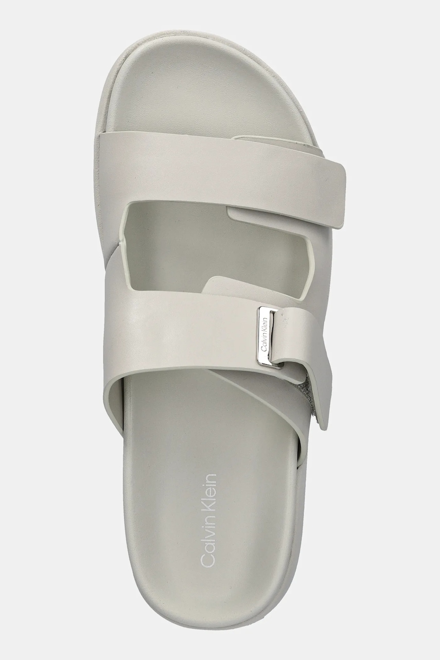 Kožené šľapky Calvin Klein FLAT ADJ SLIDE EYELET