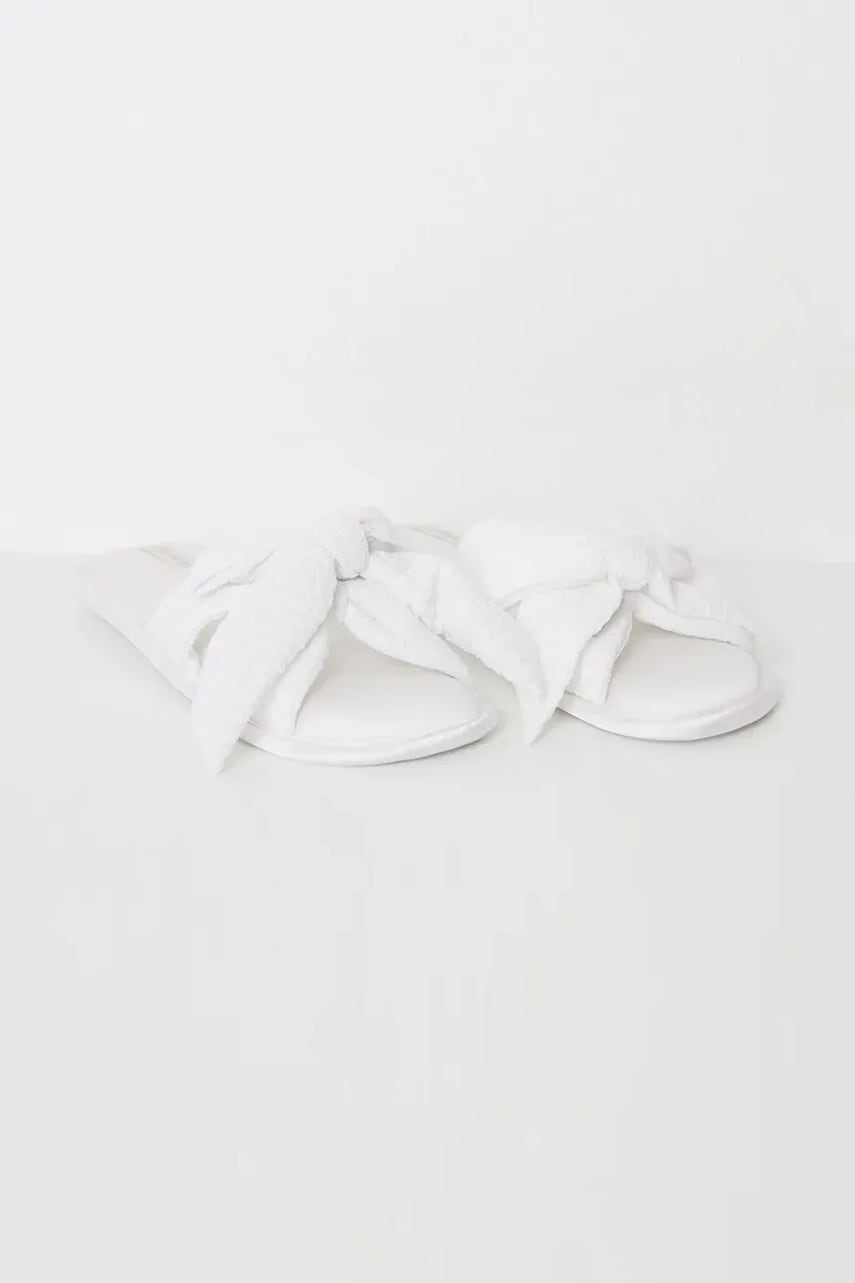 Тапки womensecret BOW OR TIE BOW HOUSE SLIPPERS цвет бежевый 4999666 Тапки womensecret BOW OR TIE BOW HOUSE SLIPPERS цвет бежевый 4999666