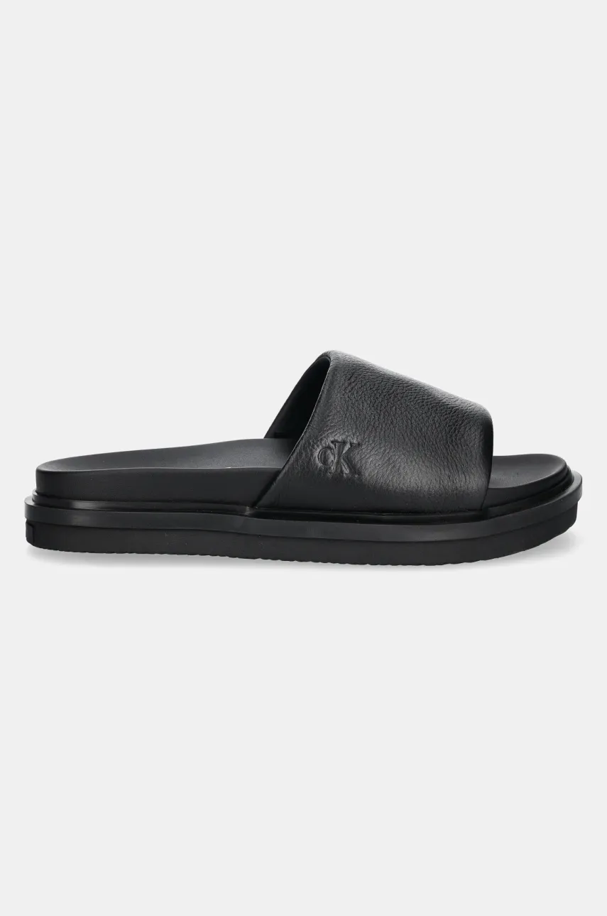 Шлепанцы Calvin Klein Jeans FLAT MOLDED SLIDE SANDAL LTH мужские цвет чёрный YM0YM01225 Шлепанцы Calvin Klein Jeans FLAT MOLDED SLIDE SANDAL LTH мужские цвет чёрный YM0YM01225