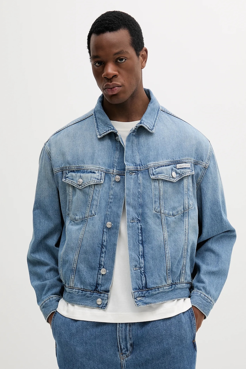 Levně Džínová bunda Calvin Klein Jeans modrá barva, přechodná, oversize, J30J327587