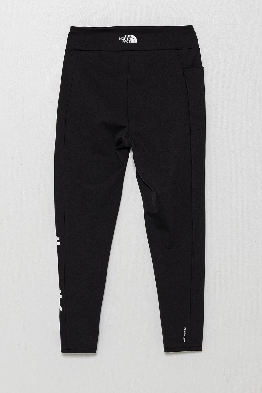 Дитячі легінси The North Face NEVER STOP TIGHT колір чорний з принтом NF0A86XVJK31