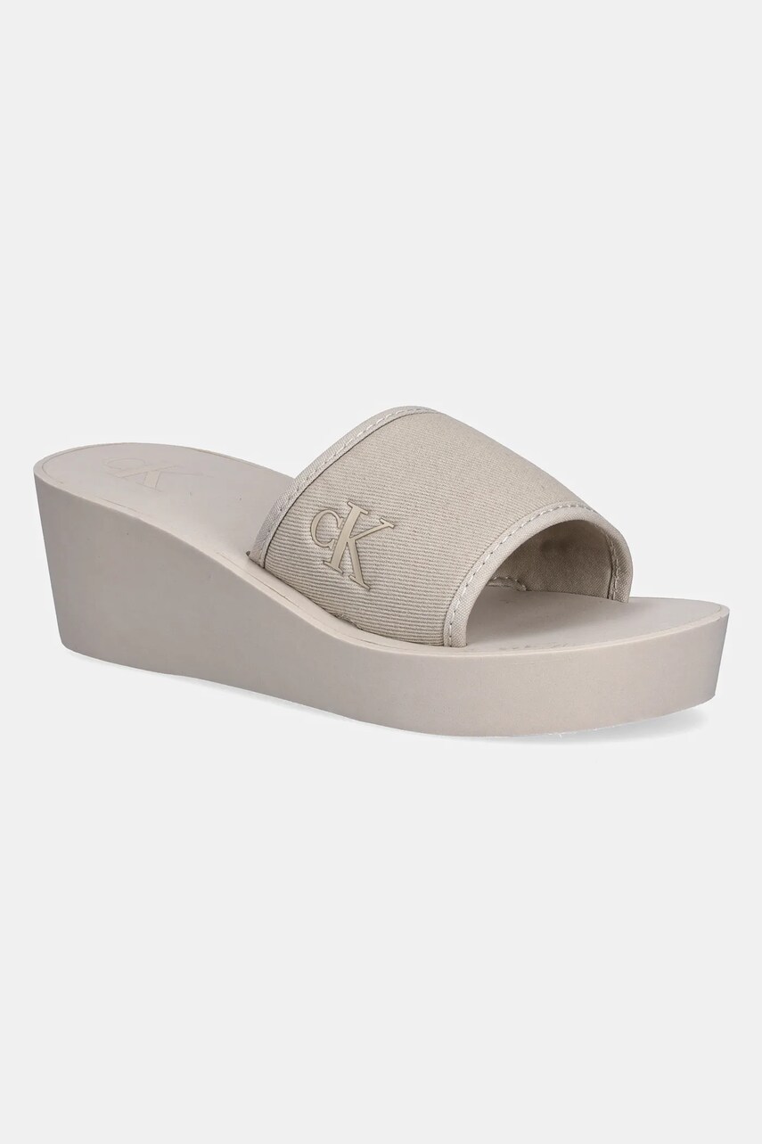 Levně Pantofle Calvin Klein Jeans BEACH WEDGE SLIDE CANVAS dámské, béžová barva, na klínku, YW0YW01725
