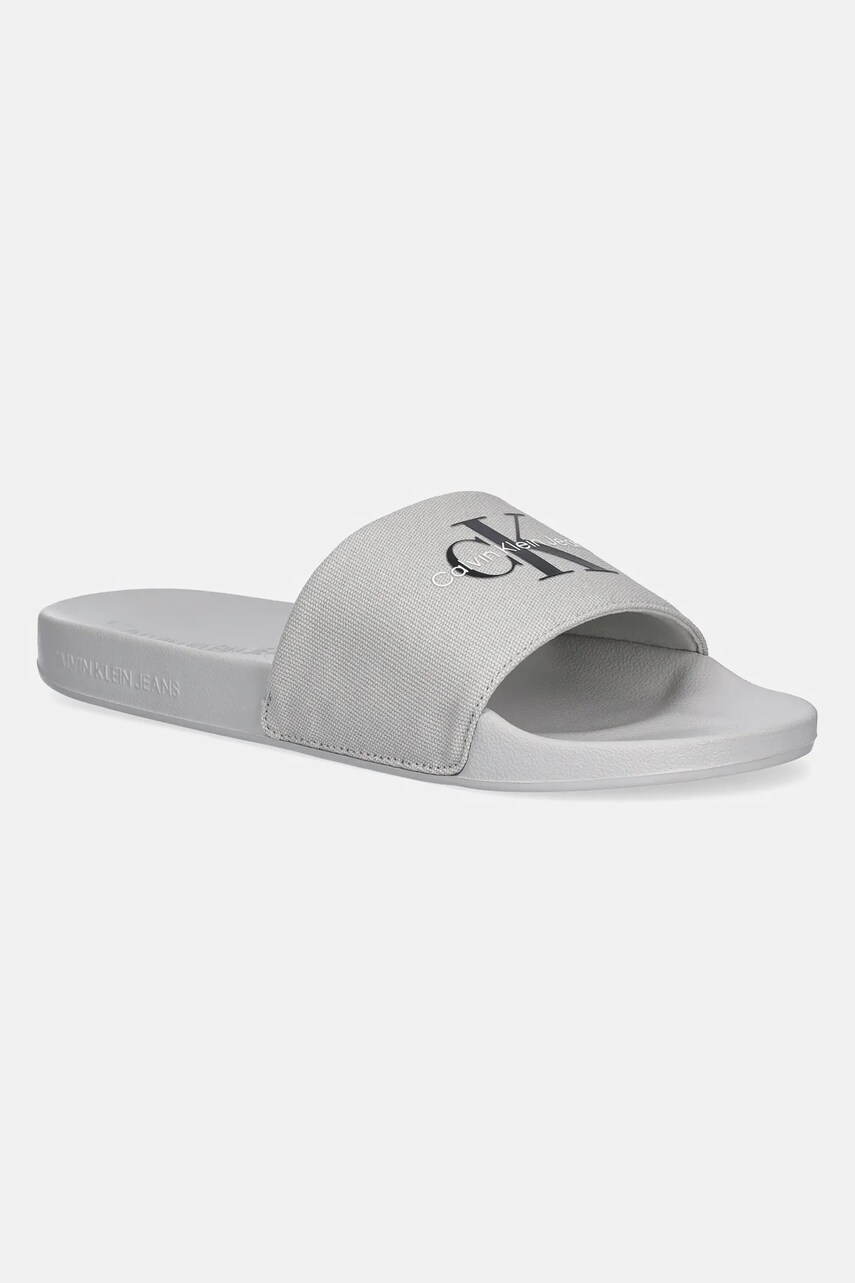 Levně Pantofle Calvin Klein Jeans SLIDE MONOGRAM pánské, šedá barva, YM0YM01271