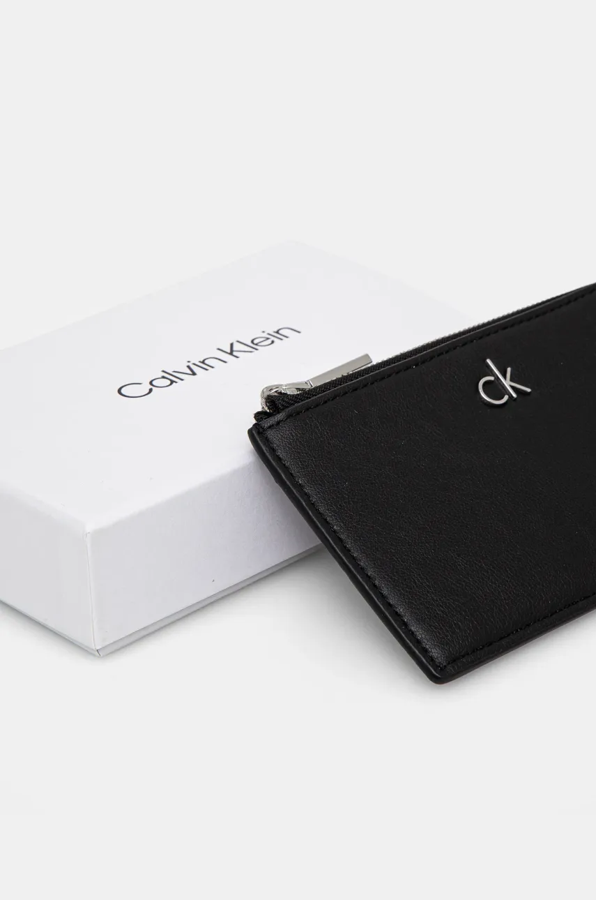 Кошелек Calvin Klein женский цвет чёрный K60K612848 Кошелек Calvin Klein женский цвет чёрный K60K612848