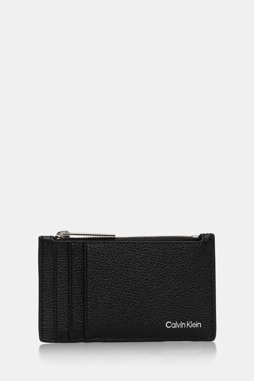 Levně Kožené pouzdro na karty Calvin Klein černá barva, K50K512704