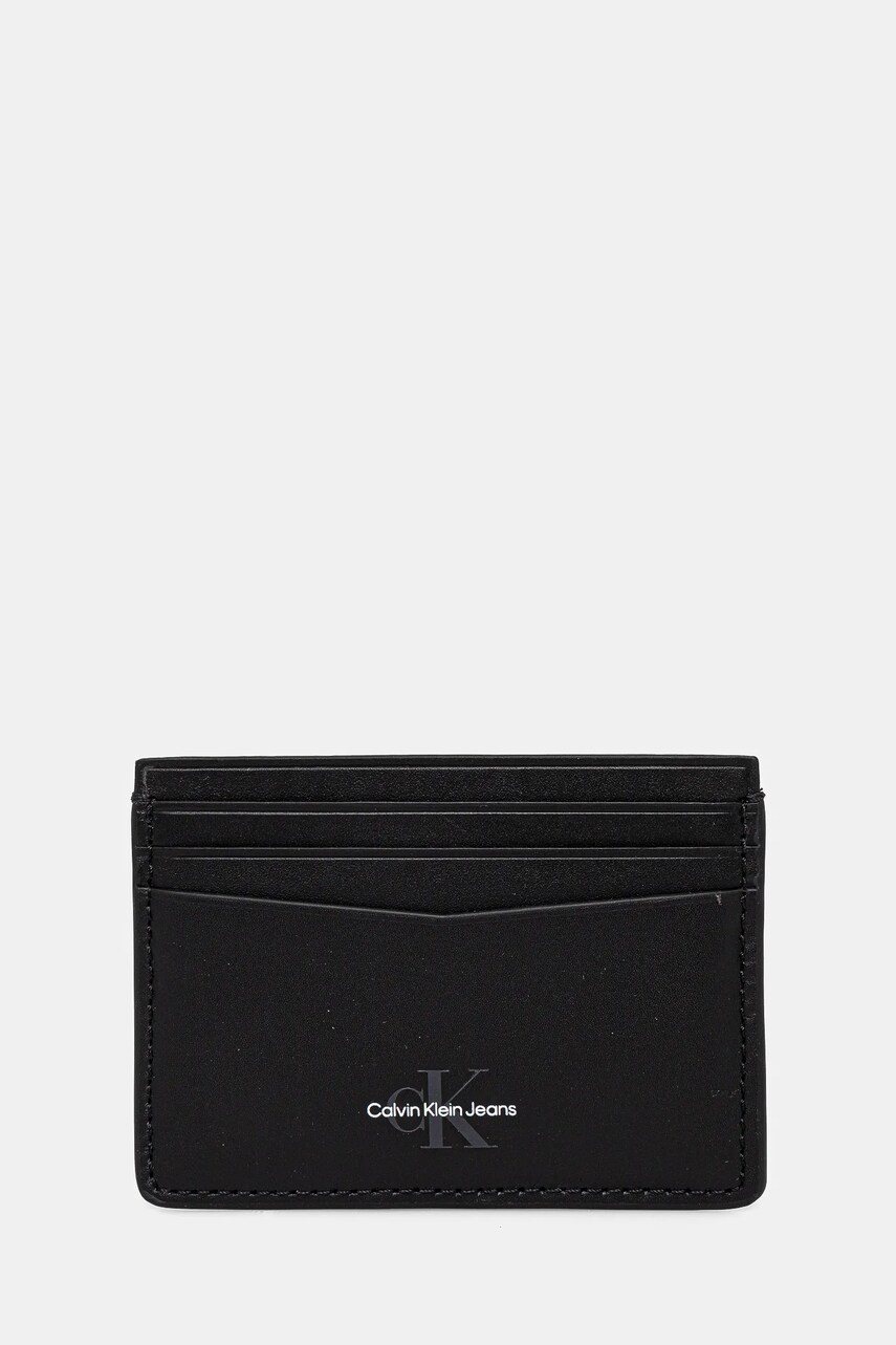 Levně Kožené pouzdro na karty Calvin Klein Jeans černá barva, K50K513180