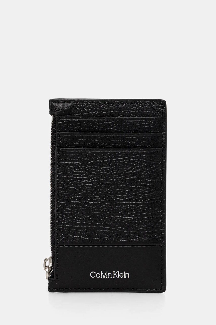 Levně Kožená peněženka Calvin Klein černá barva, K50K512848