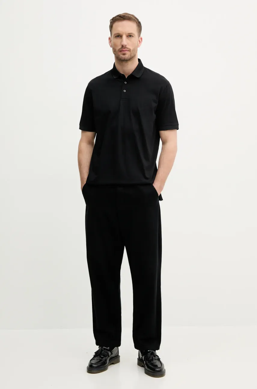 Хлопковое поло Armani Exchange мужское цвет чёрный однотонное XM000329 AF10364 Хлопковое поло Armani Exchange мужское цвет чёрный однотонное XM000329 AF10364