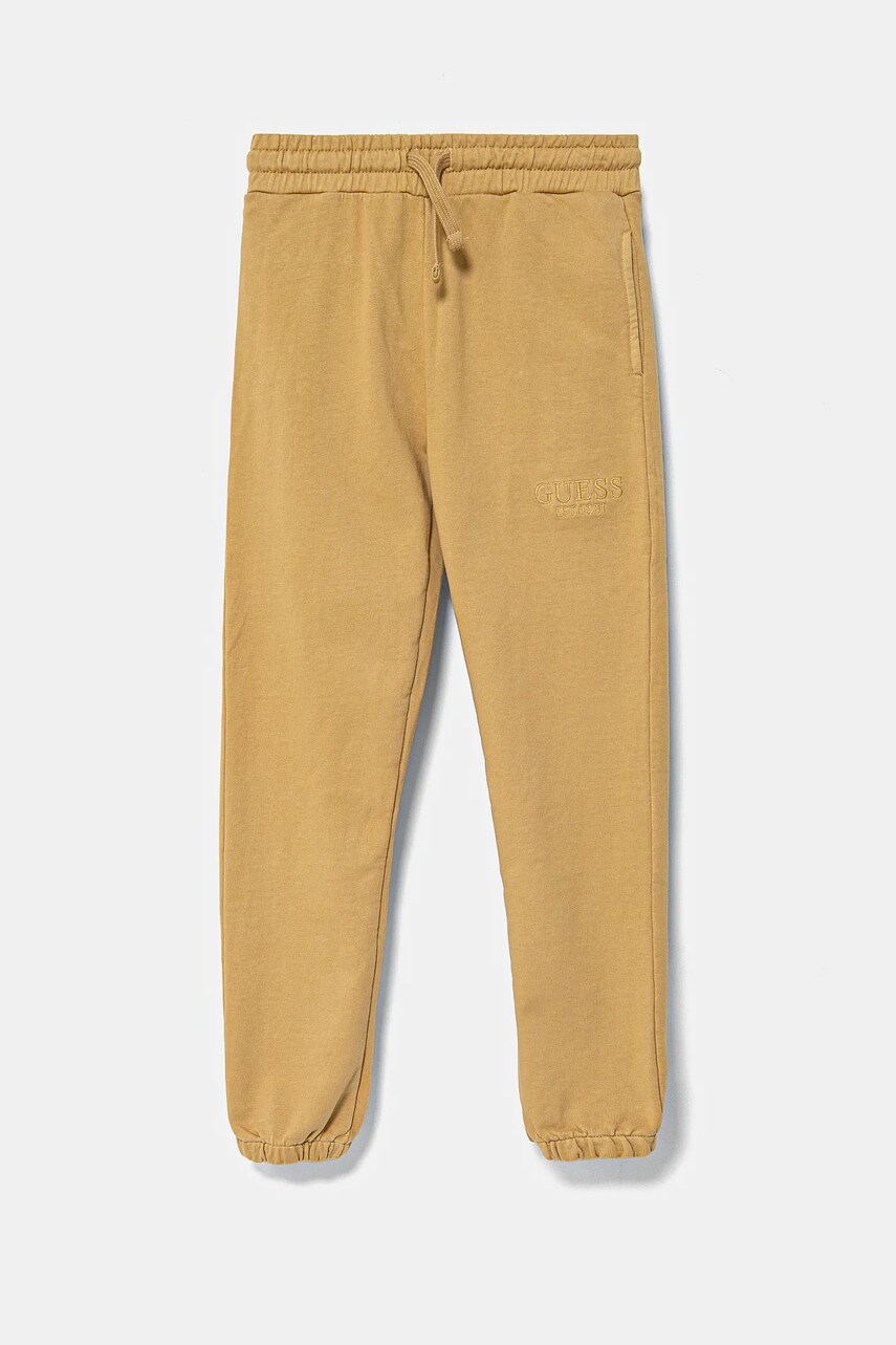 Levně Dětské bavlněné tepláky Guess žlutá barva, s aplikací, L5RQ14 KAD74