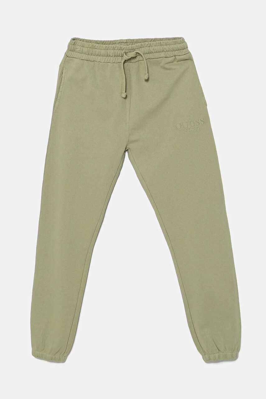 Levně Dětské bavlněné tepláky Guess zelená barva, s aplikací, L5RQ14 KAD74