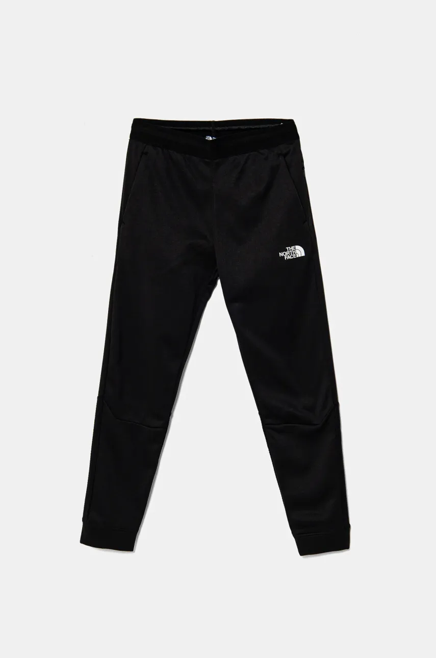 The North Face pantaloni de trening pentru copii MOUNTAIN ATHLETICS JOGGERS culoarea negru, cu imprimeu, NF0A89HWKY41