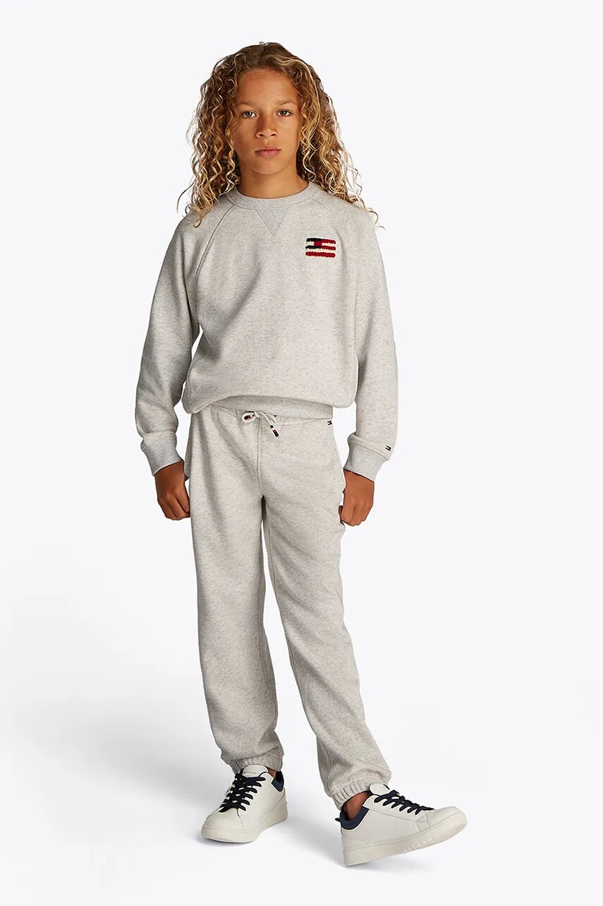 Levně Dětské tepláky Tommy Hilfiger bílá barva, hladké, KB0KB09616