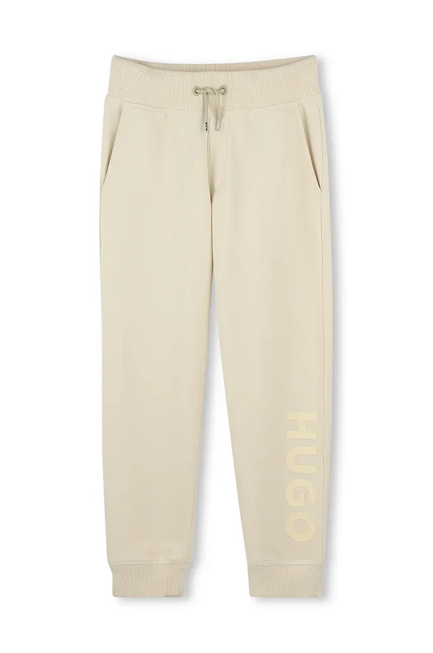 HUGO pantaloni de trening pentru copii culoarea bej, cu imprimeu, G00362