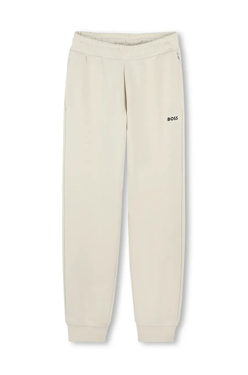 BOSS pantaloni de trening pentru copii culoarea bej, neted, J51952