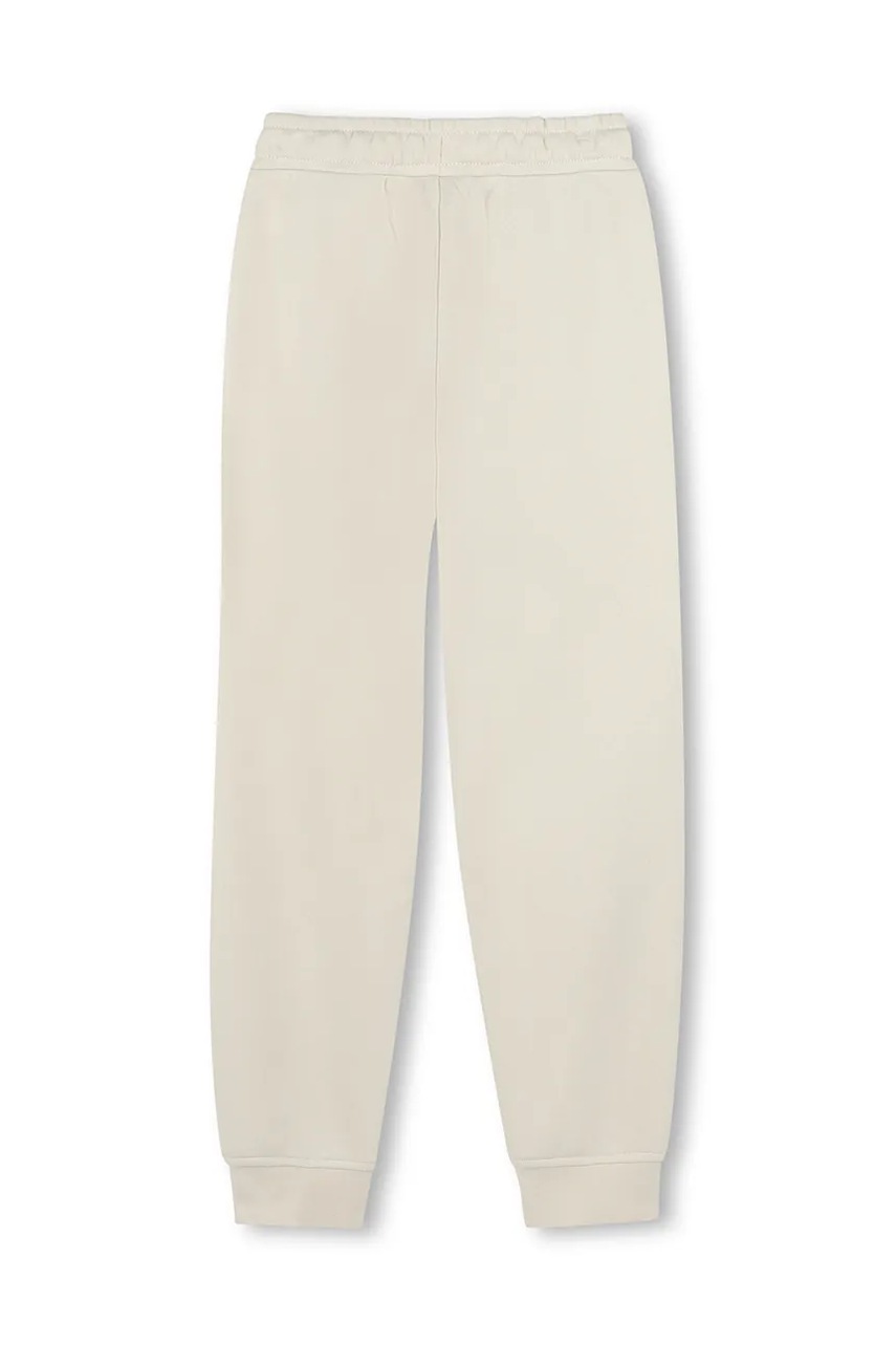 Детские спортивные штаны BOSS цвет бежевый однотонные J51952