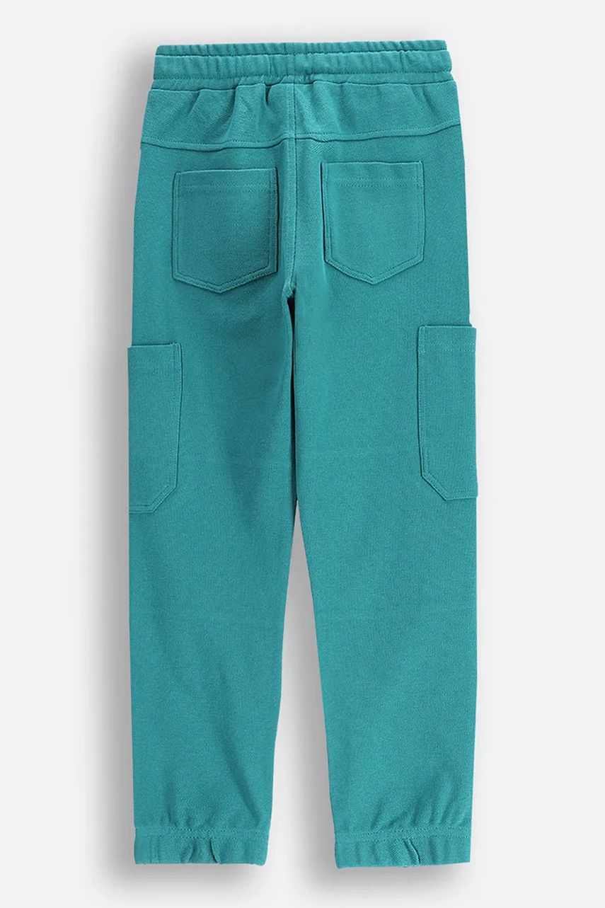 Спортивные штаны Coccodrillo цвет бирюзовый однотонные DRAGONS BOY KIDS