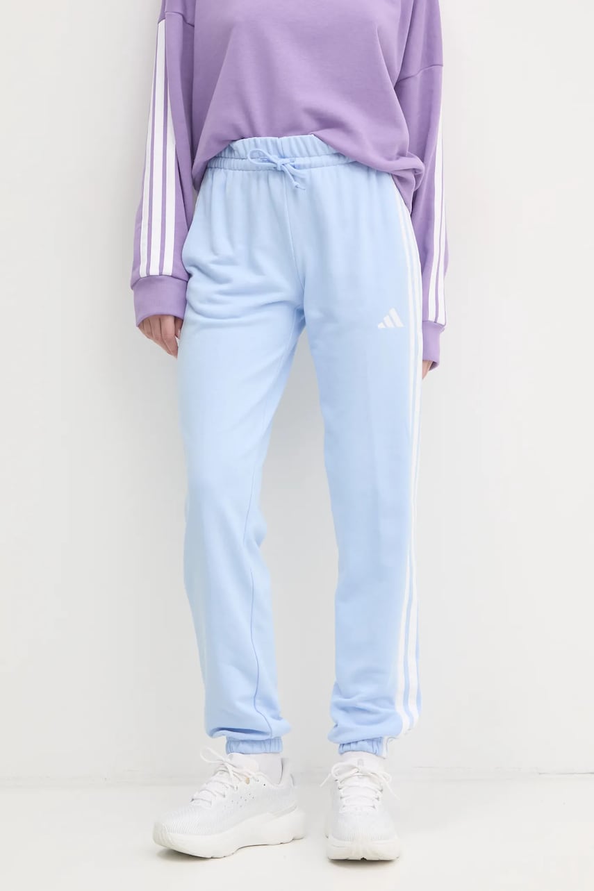 Levně Tepláky adidas Essentials modrá barva, s aplikací, JD5300