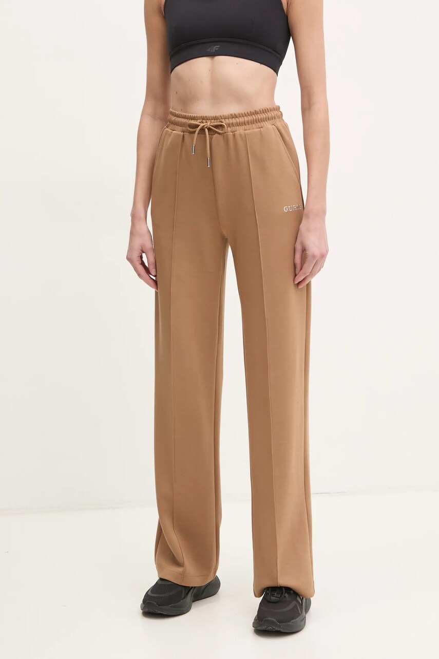Levně Tepláky Guess GELSEY zelená barva, hladké, V5RB19 KCOB2