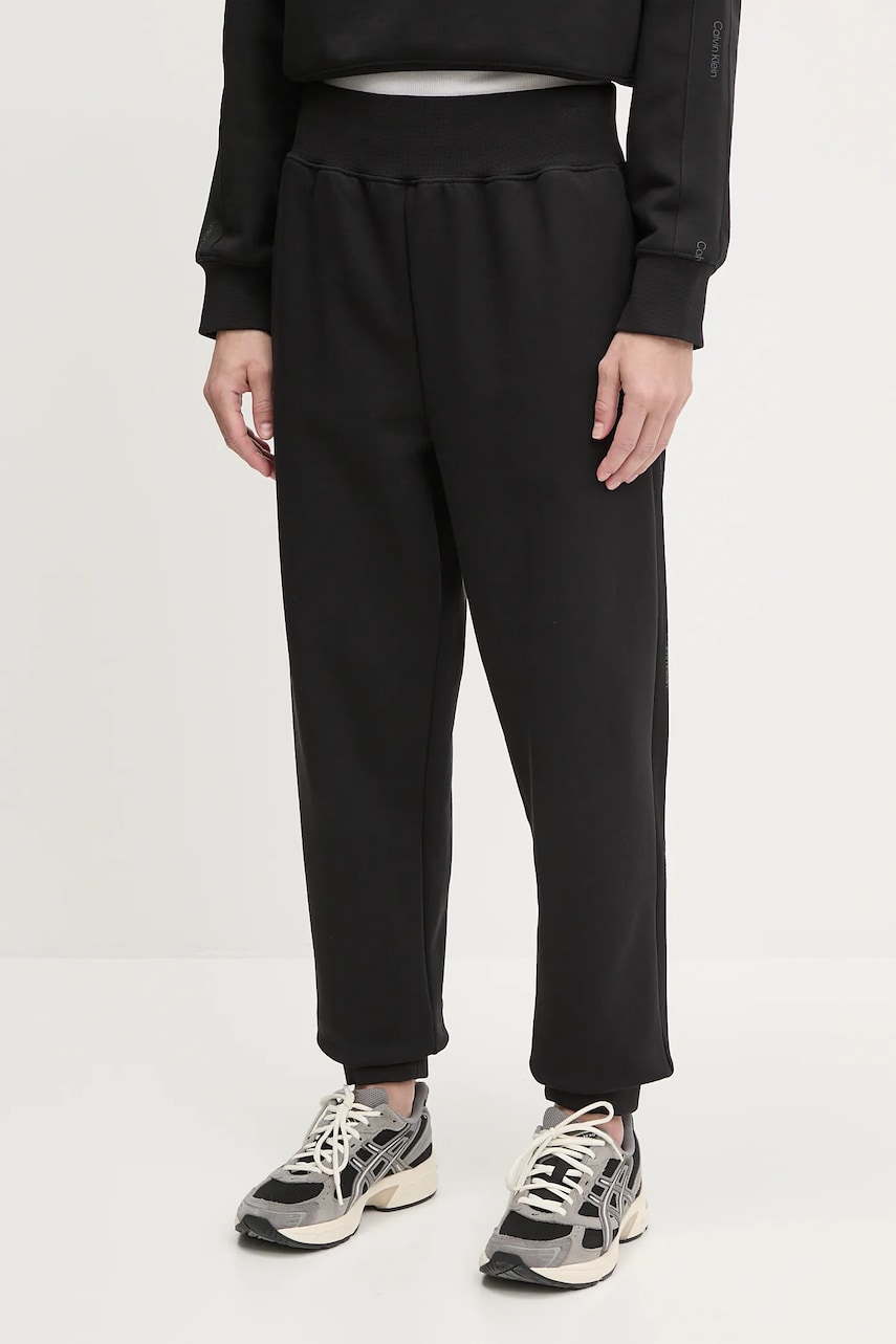 Levně Tepláky Calvin Klein Performance dámské, černá barva, s aplikací, LVGWS5P608